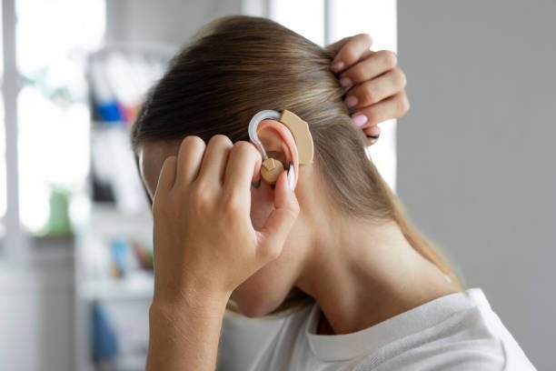 Woman wearing a hearing aid